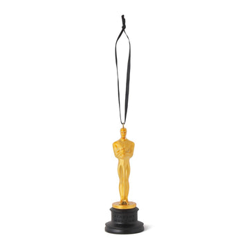 Gold Oscar statuette christmas collectible ornament on a white background